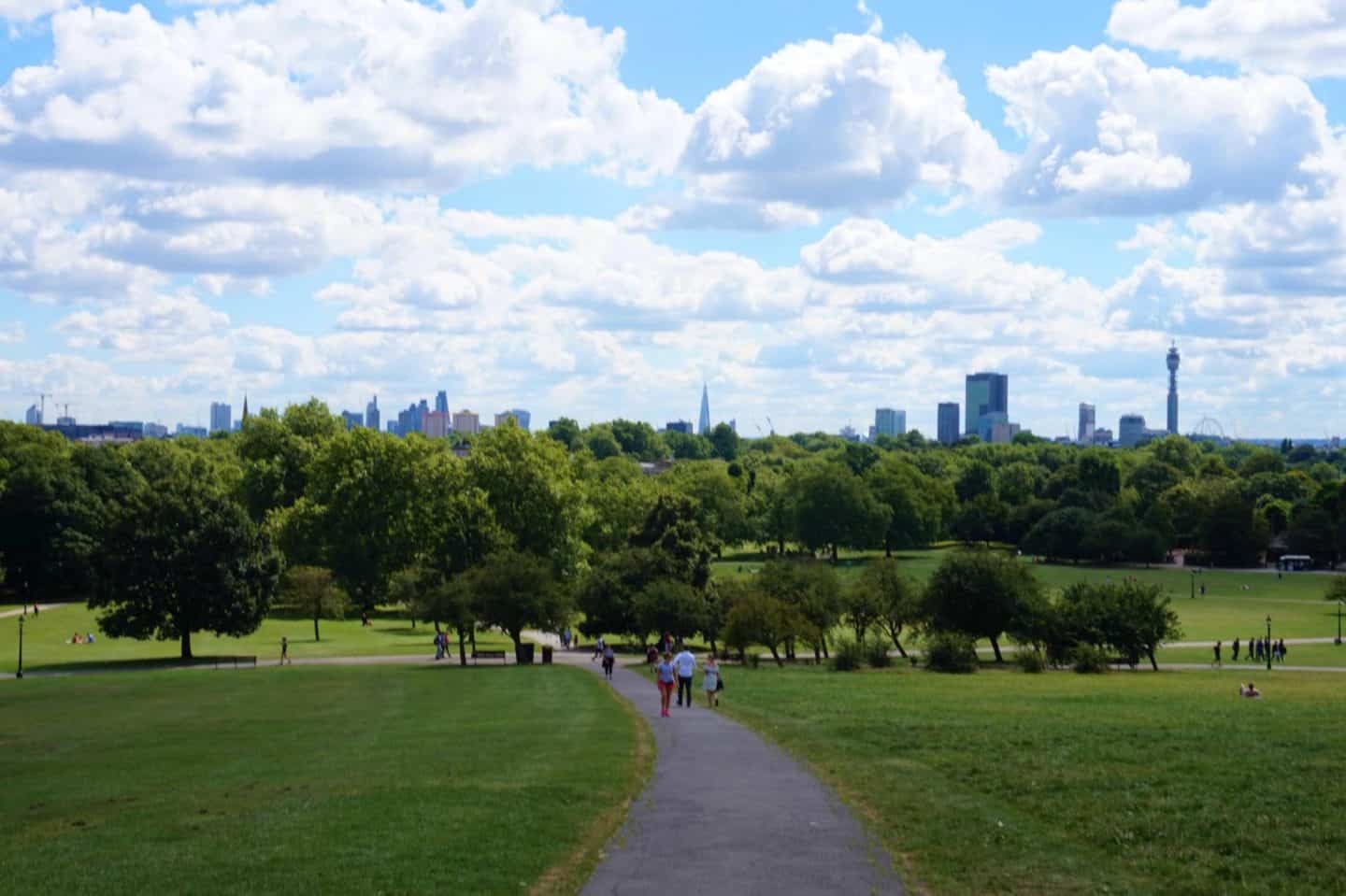 picnic in a london park with a city view primrose hill