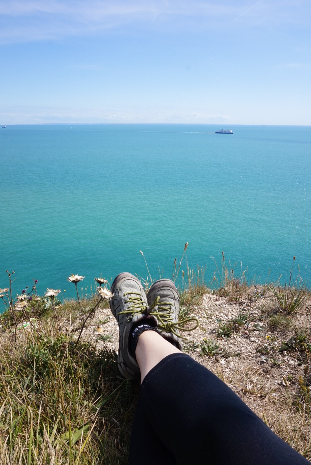 white cliffs of dover from London, boots and the view of white cliffs of dover