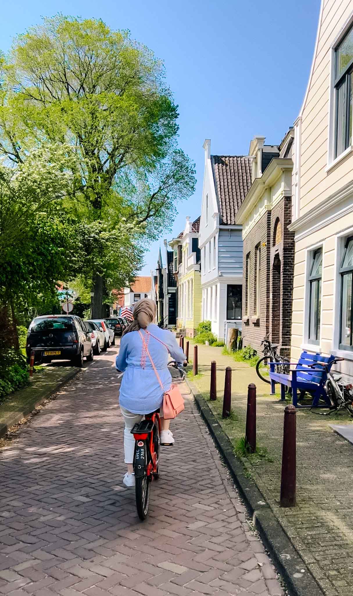 The Wandering Quinn Travel Blog Amsterdam solo travel, Ellie biking in Amsterdam Noord 