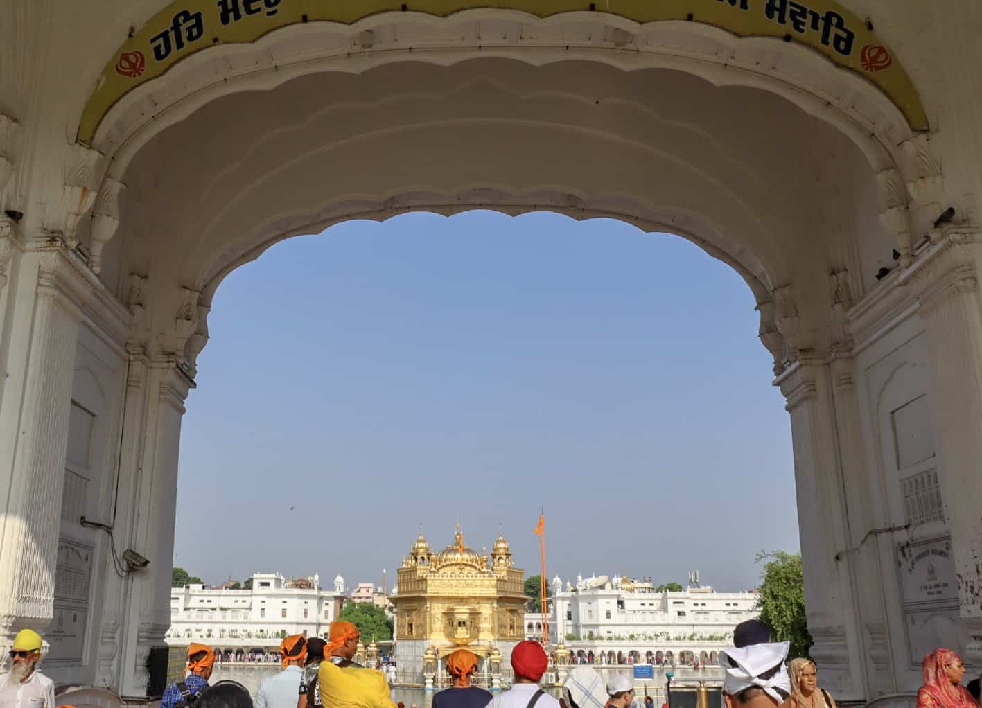 Golden Temple Amritsar entrance with blue sky