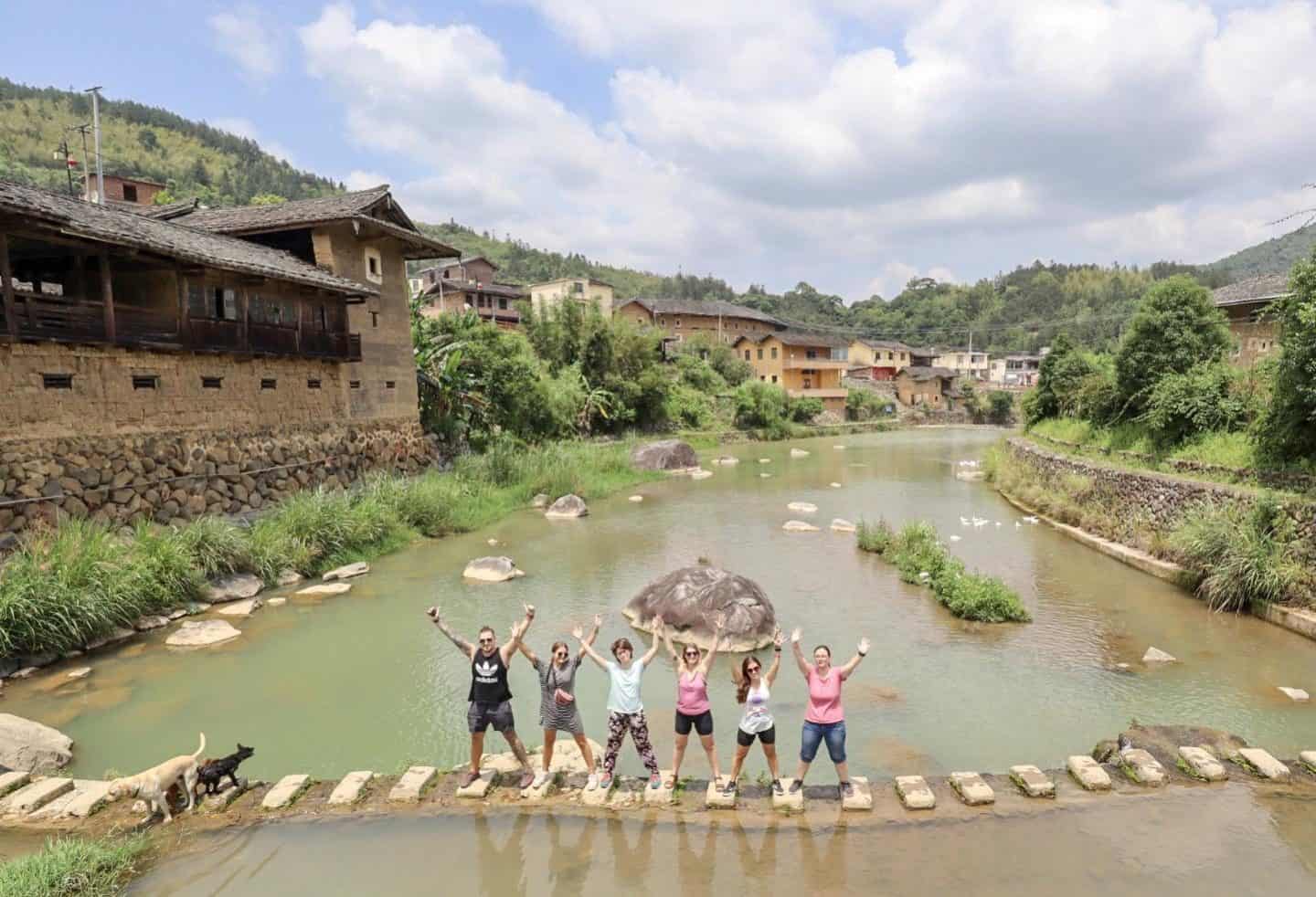 people standing in river in china | backpacking checklist