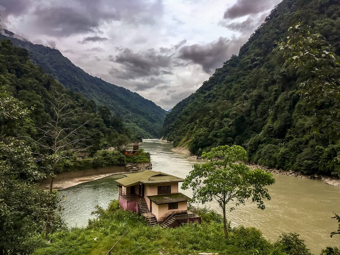 sikkim mountains and river in monsoon | best places to travel in Asia in July and August