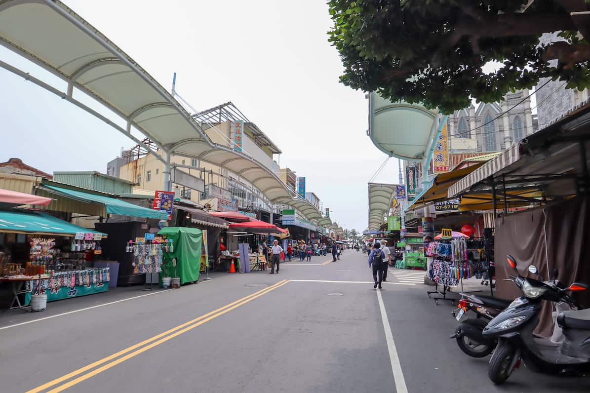 Kaohsiung to Cijin Island, Cijin Island street with shops and bike hire