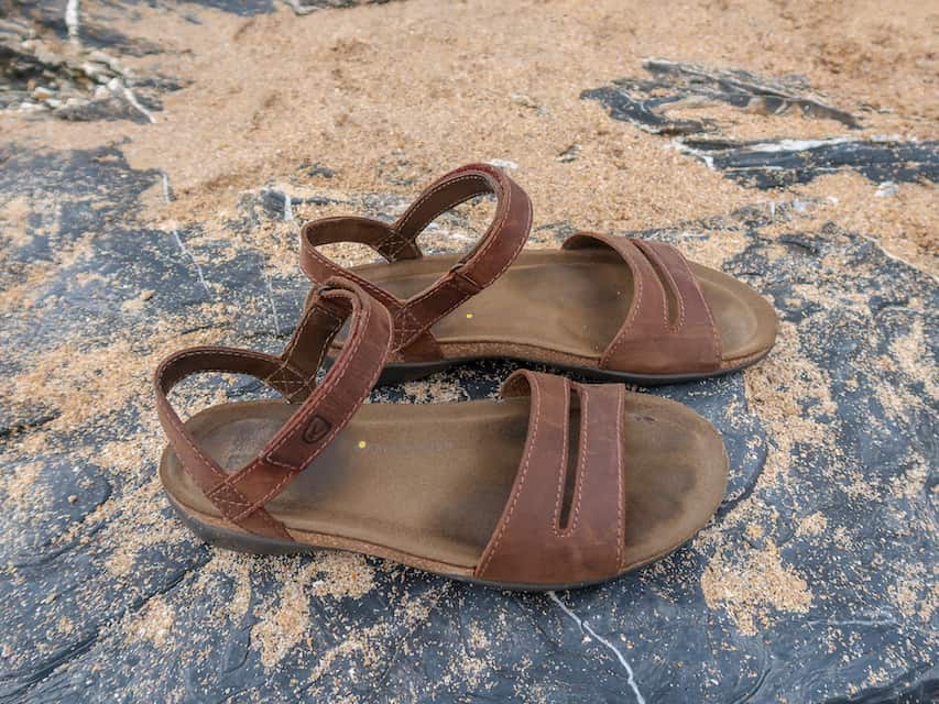female packing list India, Keen Brown Sandals on rock with sand
