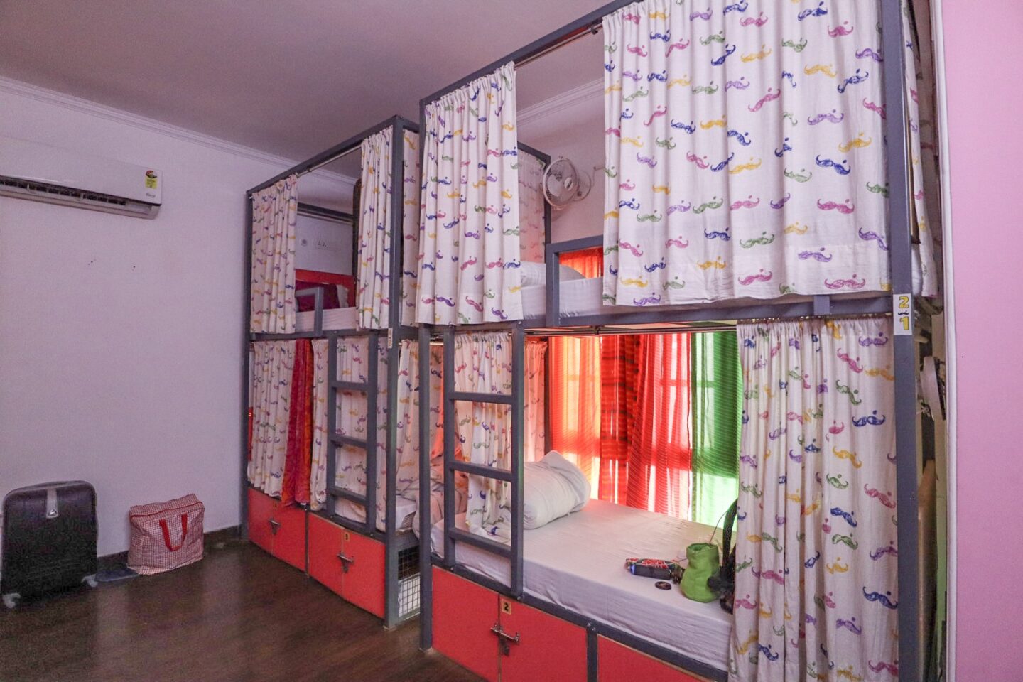 planning a trip to India, moustache hostel new delhi female dorm room bunkbeds with curtains