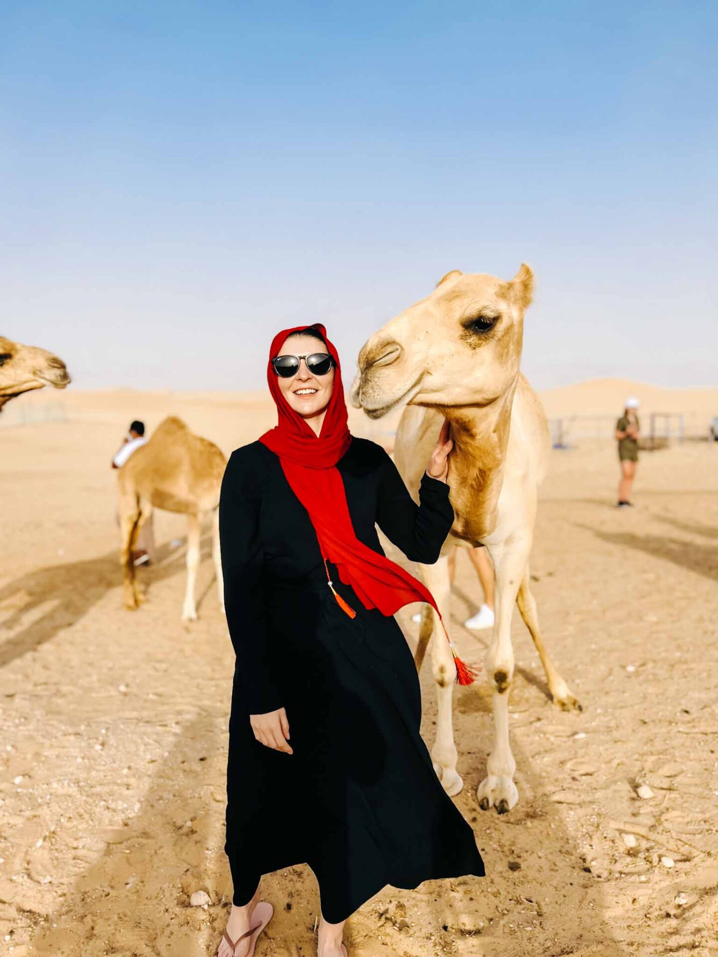What to wear in Abu Dhabi, desert safari with camel