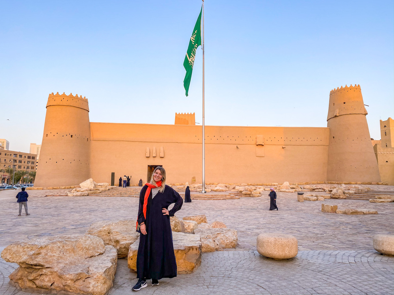 Riyadh travel guide, ellie quinn at masmak fort in Riyadh in an abaya