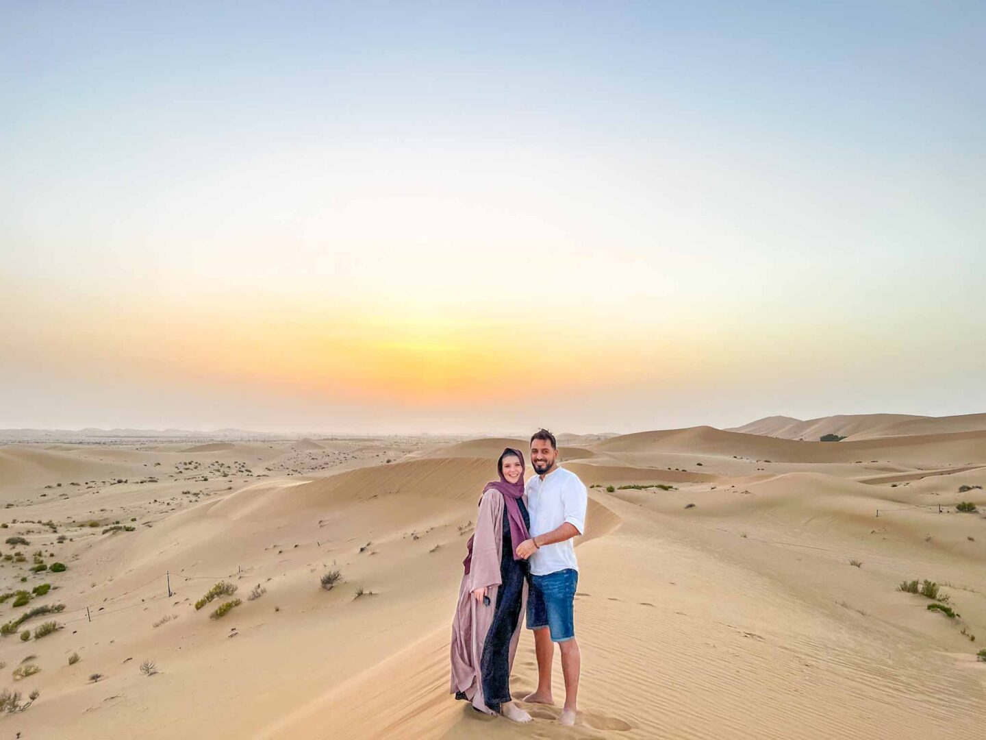 Things to do in Abu Dhabi, couple on Abu Dhabi Desert Safari 