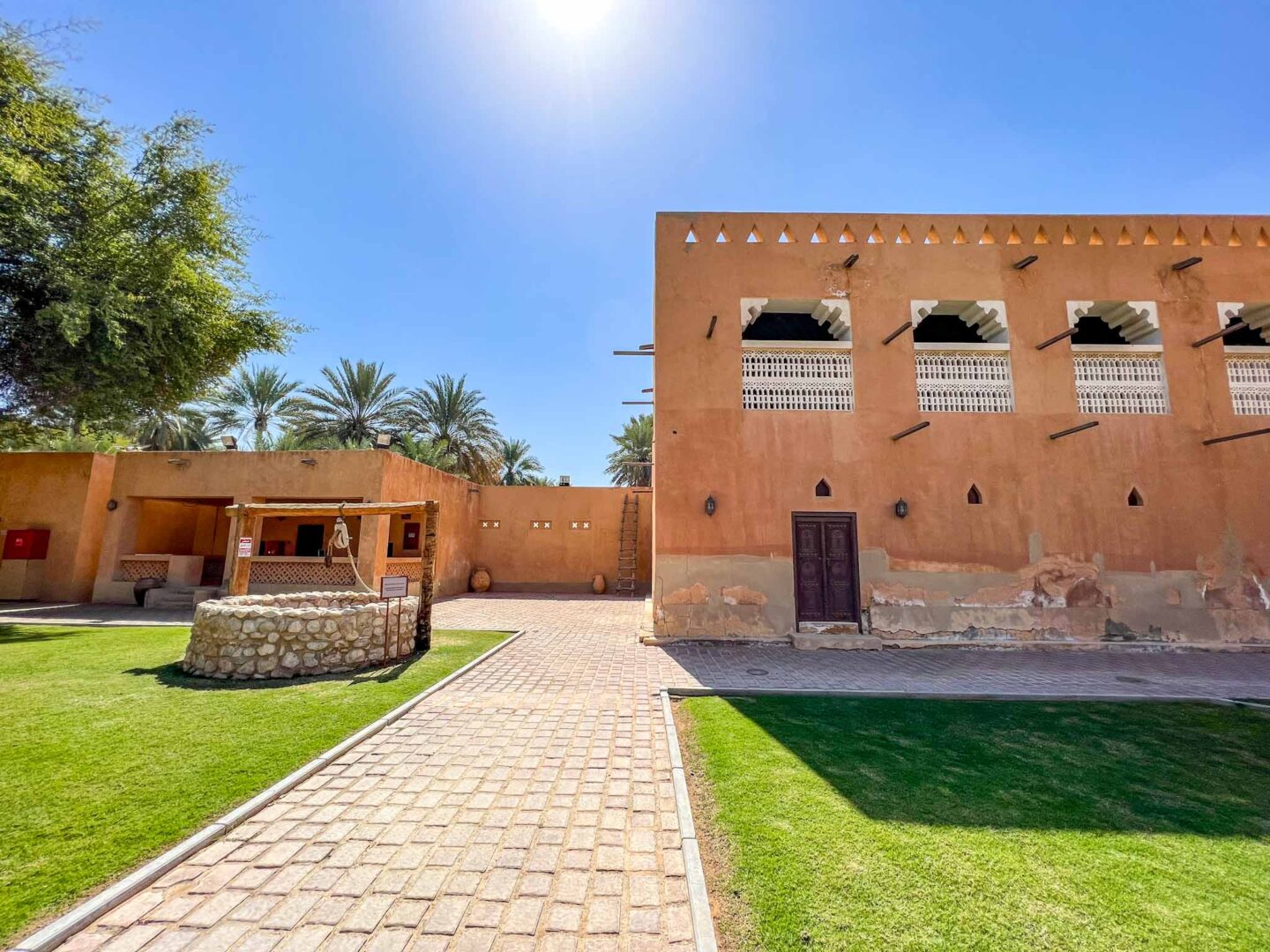 The Wandering Quinn Travel Blog things to do in al ain, Al Ain Palace Museum garden grounds