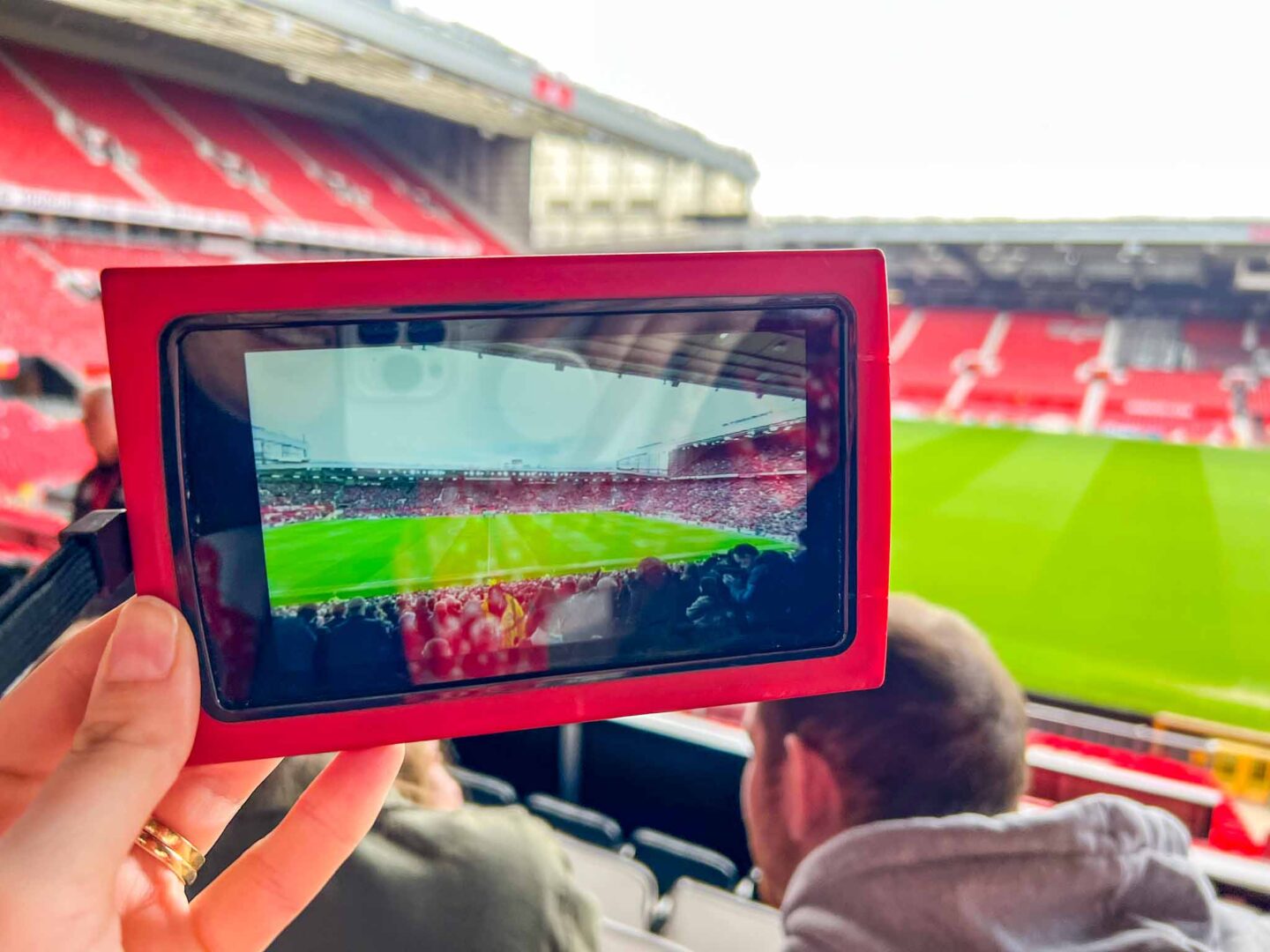 The Wandering Quinn Travel Blog Manchester United Stadium Tour, multimedia guide showing stadium full