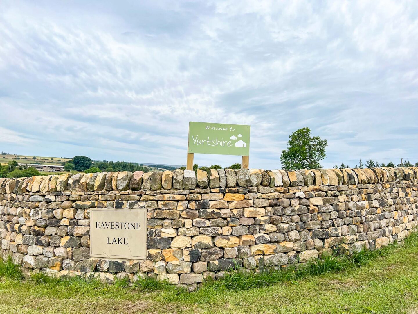 The Wandering Quinn Travel Blog Glamping in Yorkshire, Yurtshire Eavestone Lakes Sign