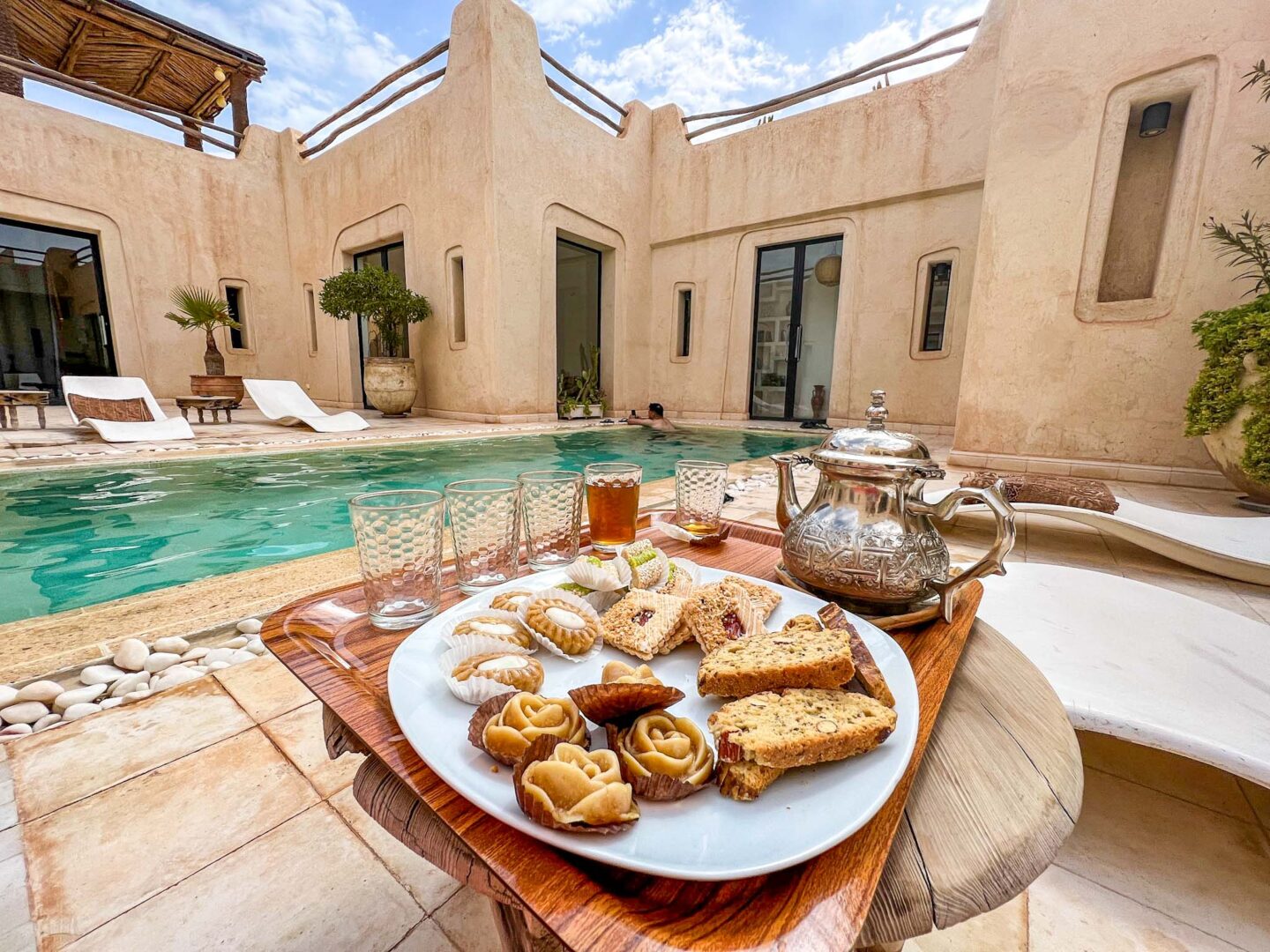 private villa in Marrakech with Moroccan mint tea by the pool