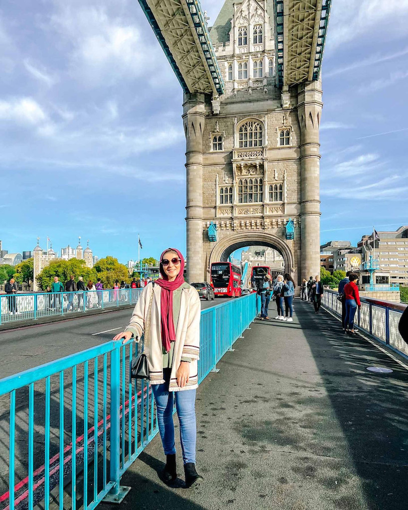 The Wandering Quinn Travel Blog Ellie on Tower bridge, London with kids, London with kids itinerary,