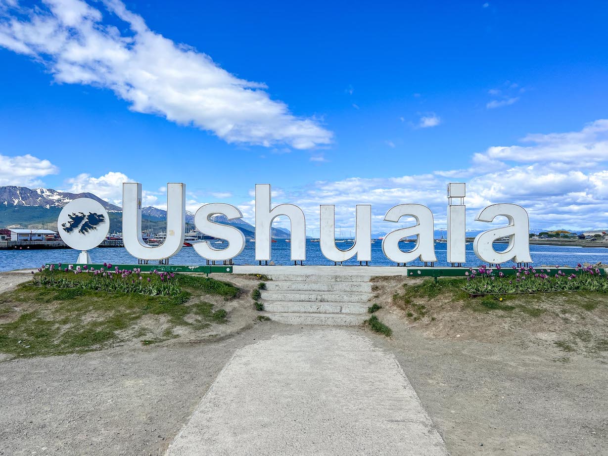 things to do in Ushuaia, Ushuaia sign in daytime with blue sky