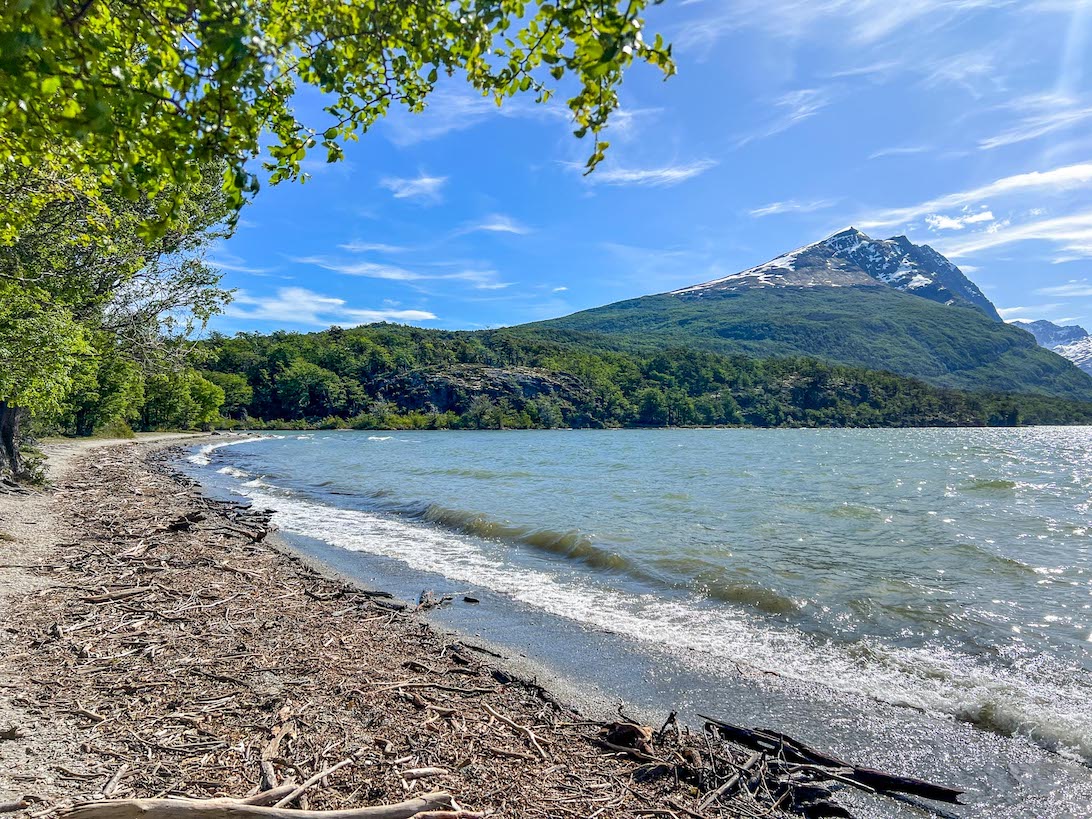 things to do in Ushuaia, Lake Roca beach and water on sunny day Tierra del Fuego National Park,