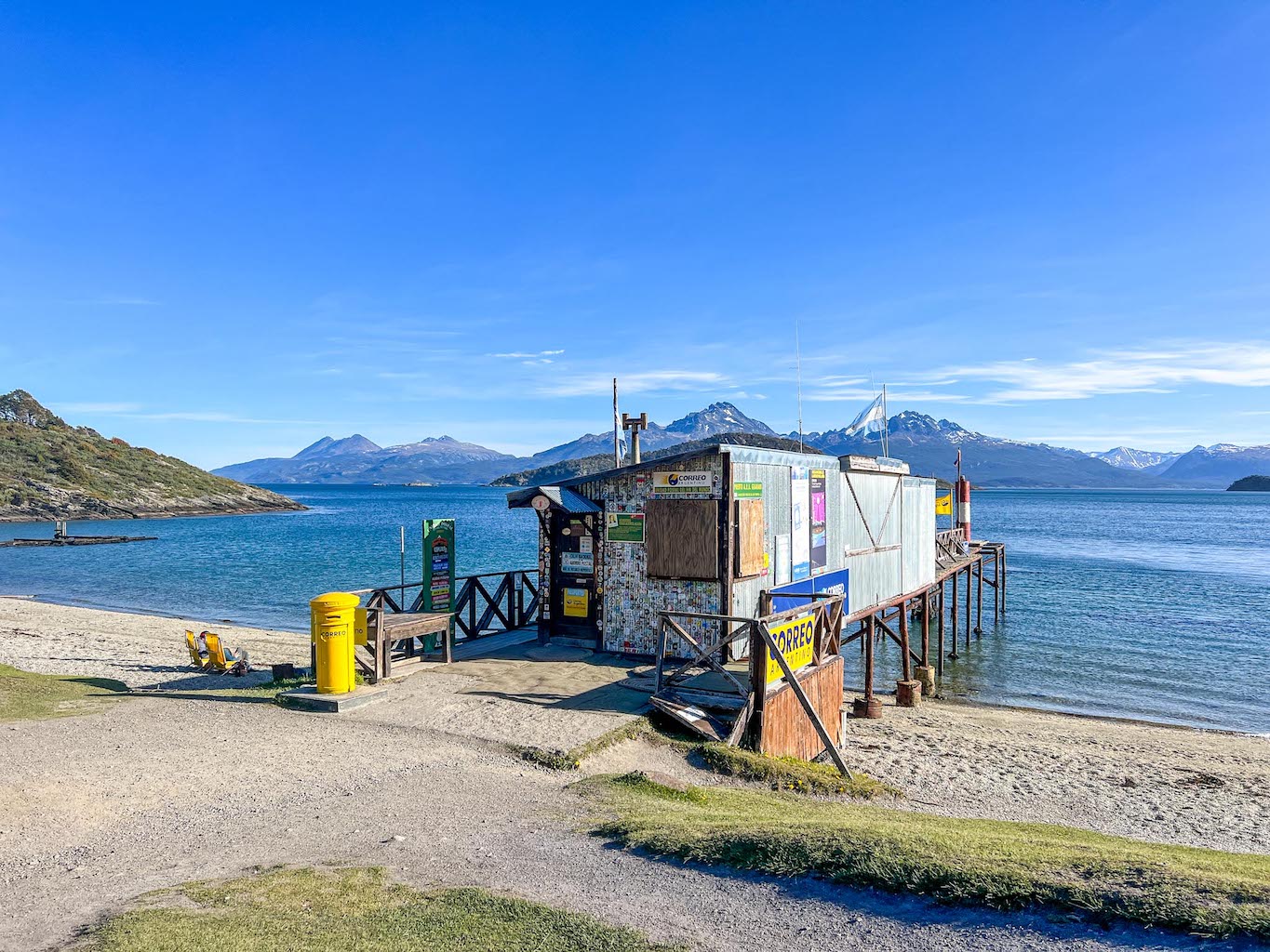 things to do in Ushuaia,  Ushuaia post office at the end of the world with beach and water behind