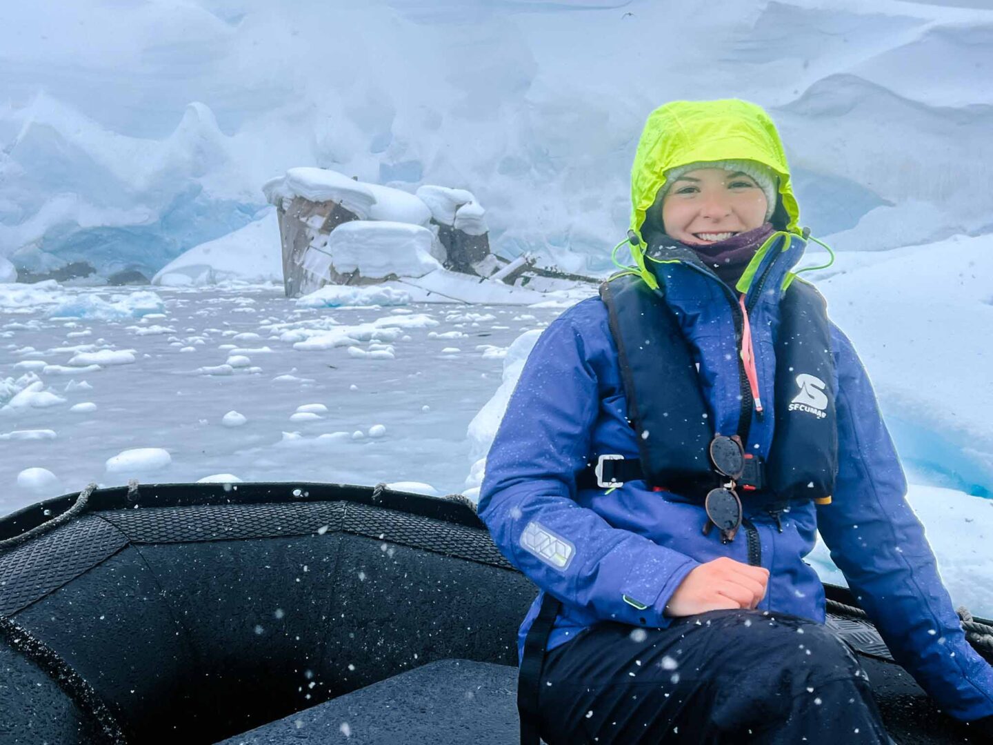 Antarctica in November, Best time to visit Antarctica, Ellie on Zodiac boat in snow