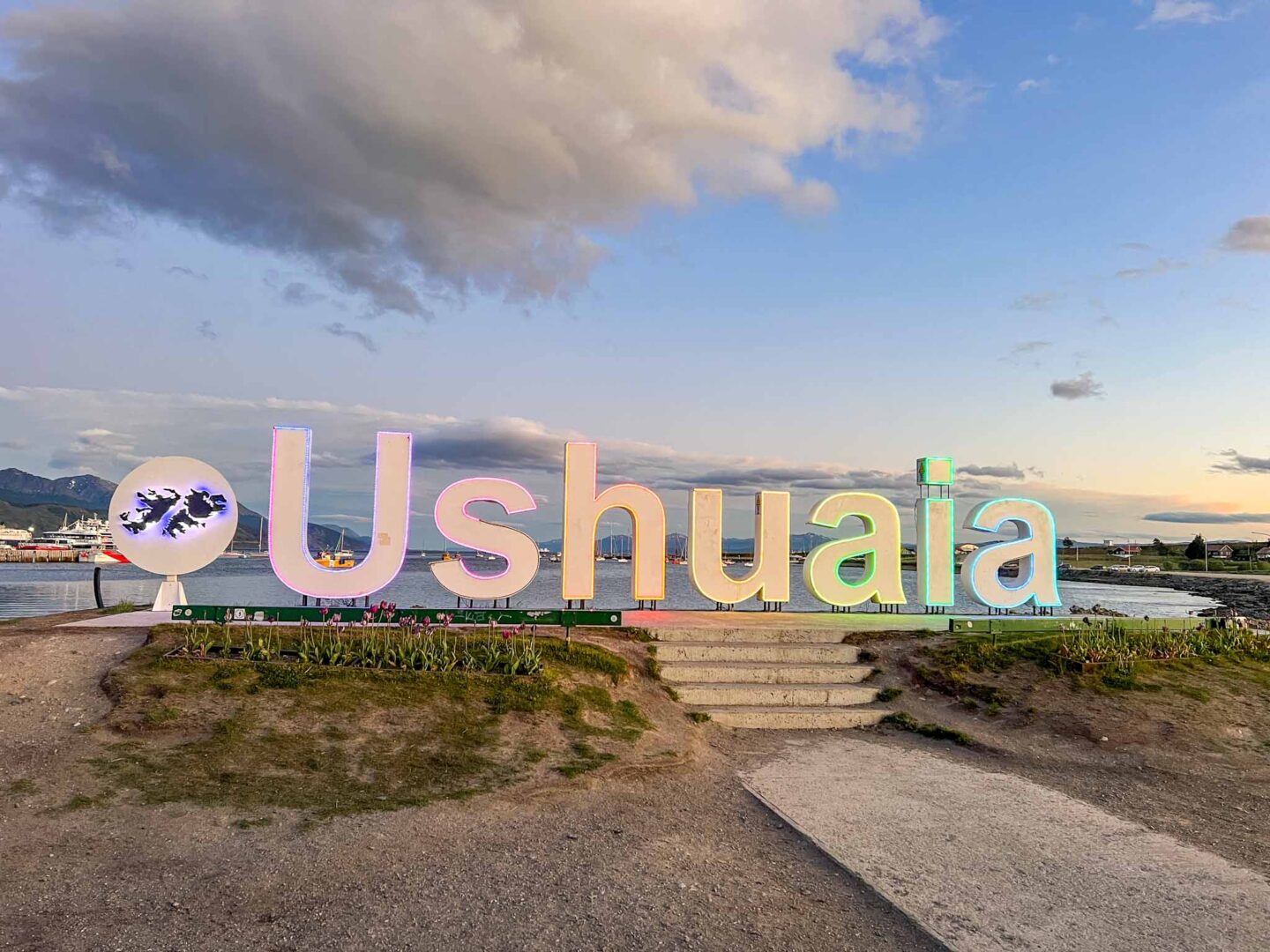 things to do in Ushuaia, Ushuaia sign lit up at sunset