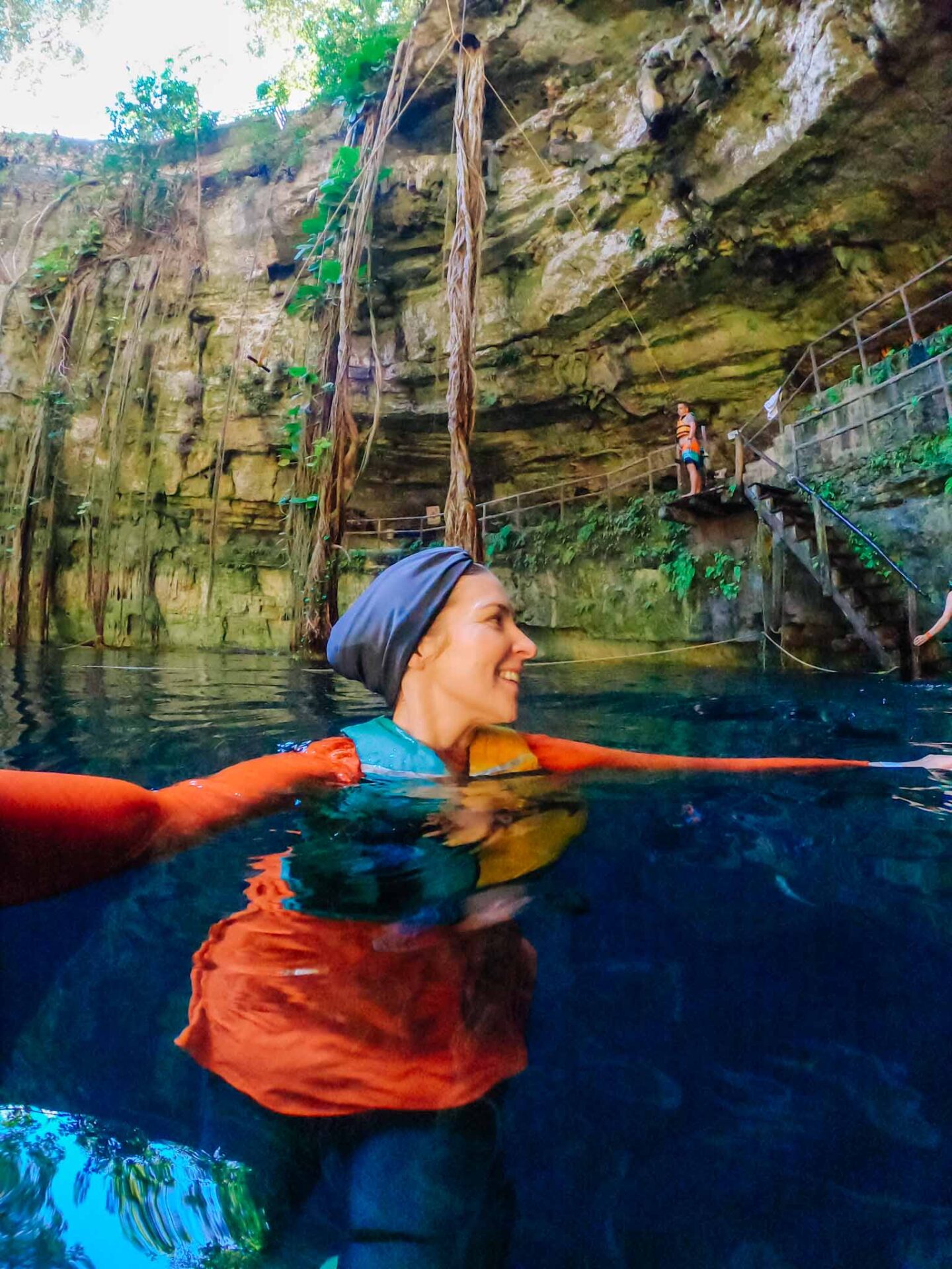 Ellie swimming in Oxman Cenote, Yucatan Road Trip, 1 week Mexico itinerary,