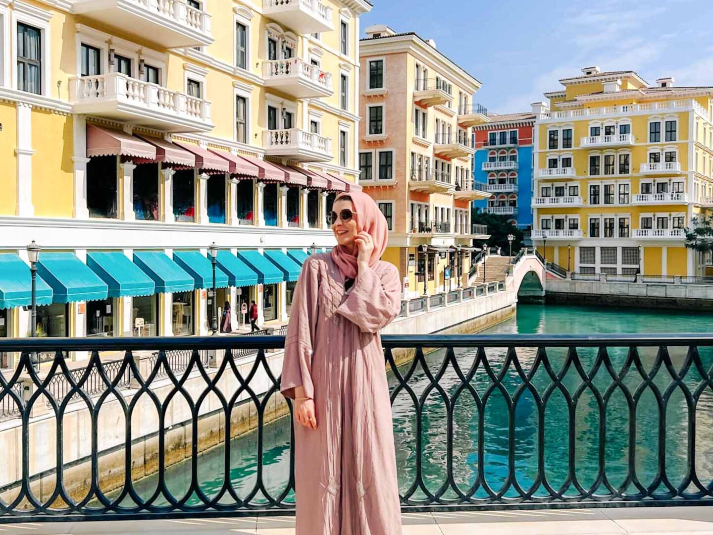 Ellie in Pink Abaya on the pearl in Doha, Qatar dress code, what to wear in Qatar,