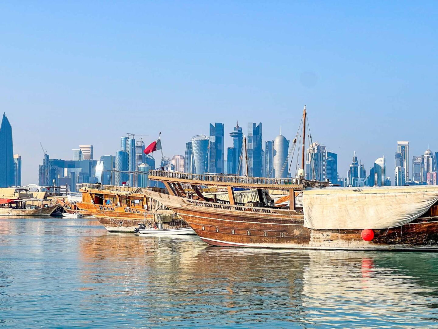 Doha west bay city skyline with Dhow boats in front, Qatar Stopover, one day in Doha,