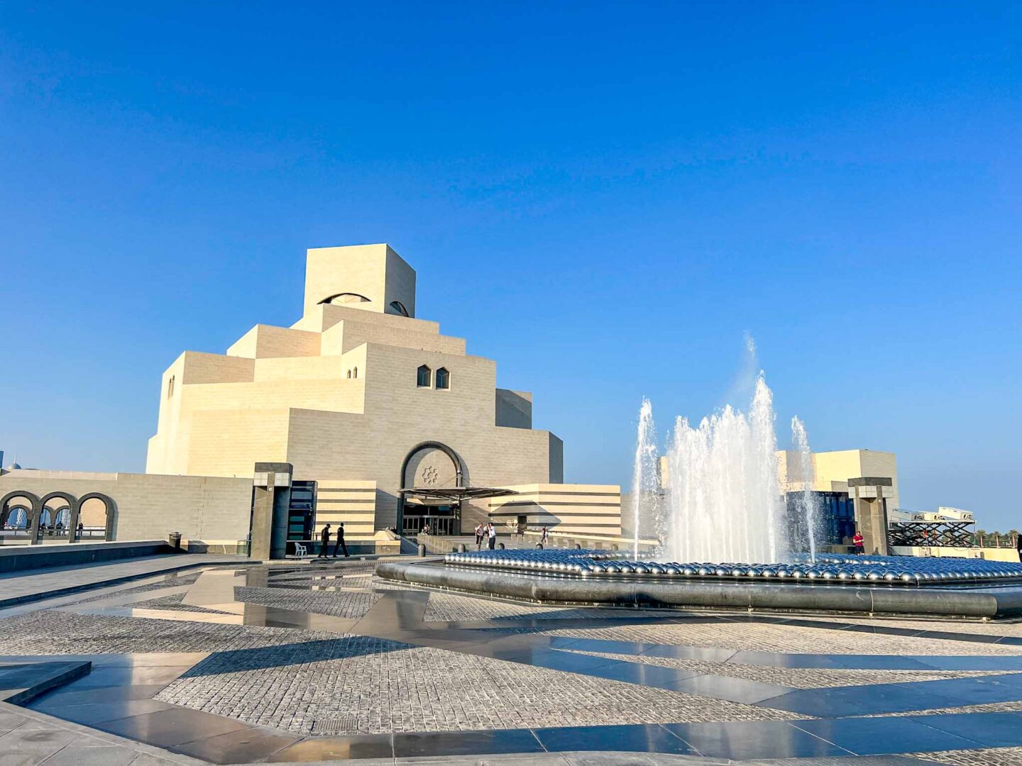outside the museum of islamic art with fountain, Qatar Stopover, one day in Doha,