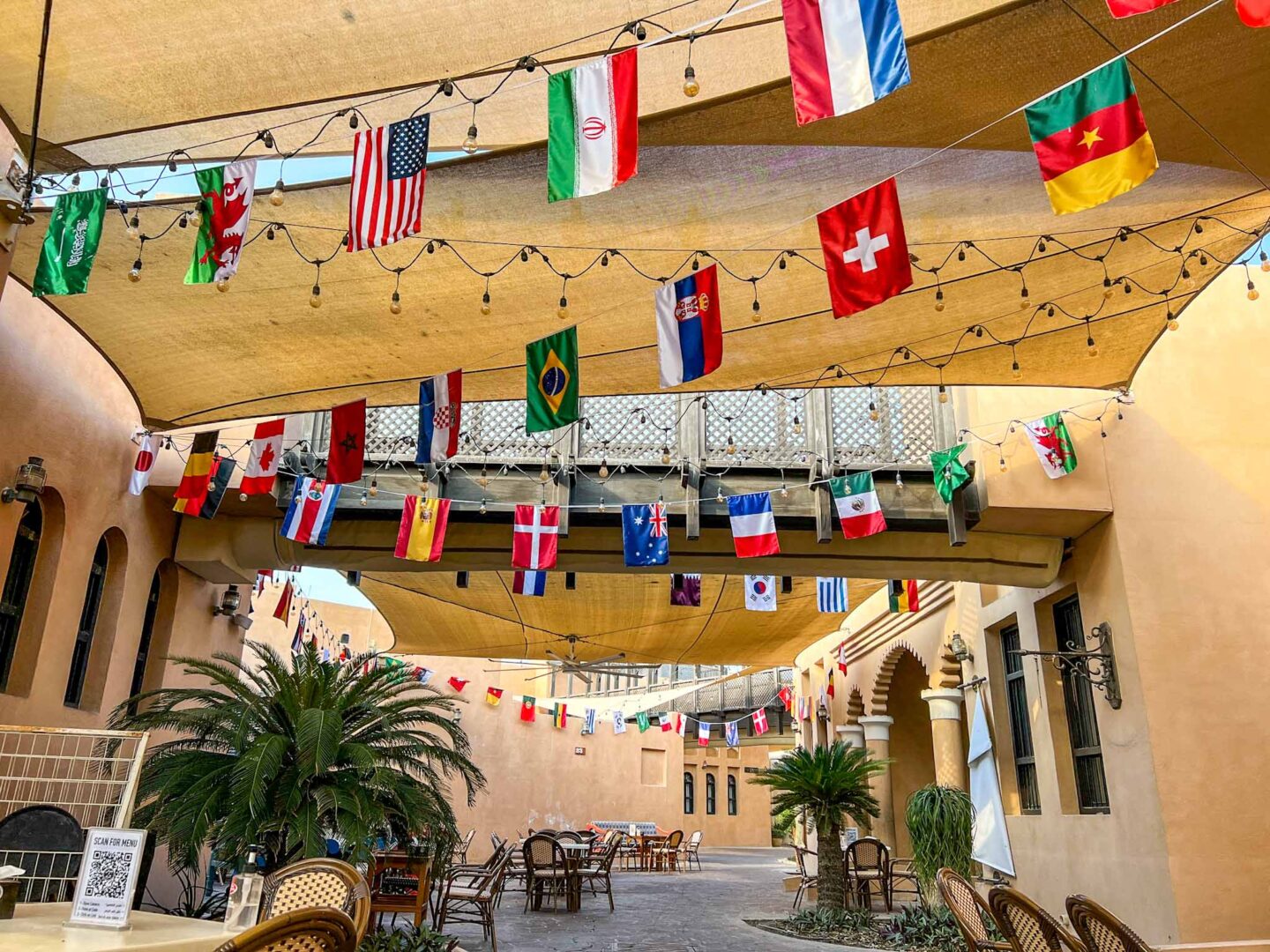 Katara Cultural Village streets with flags, Qatar Stopover, one day in Doha,