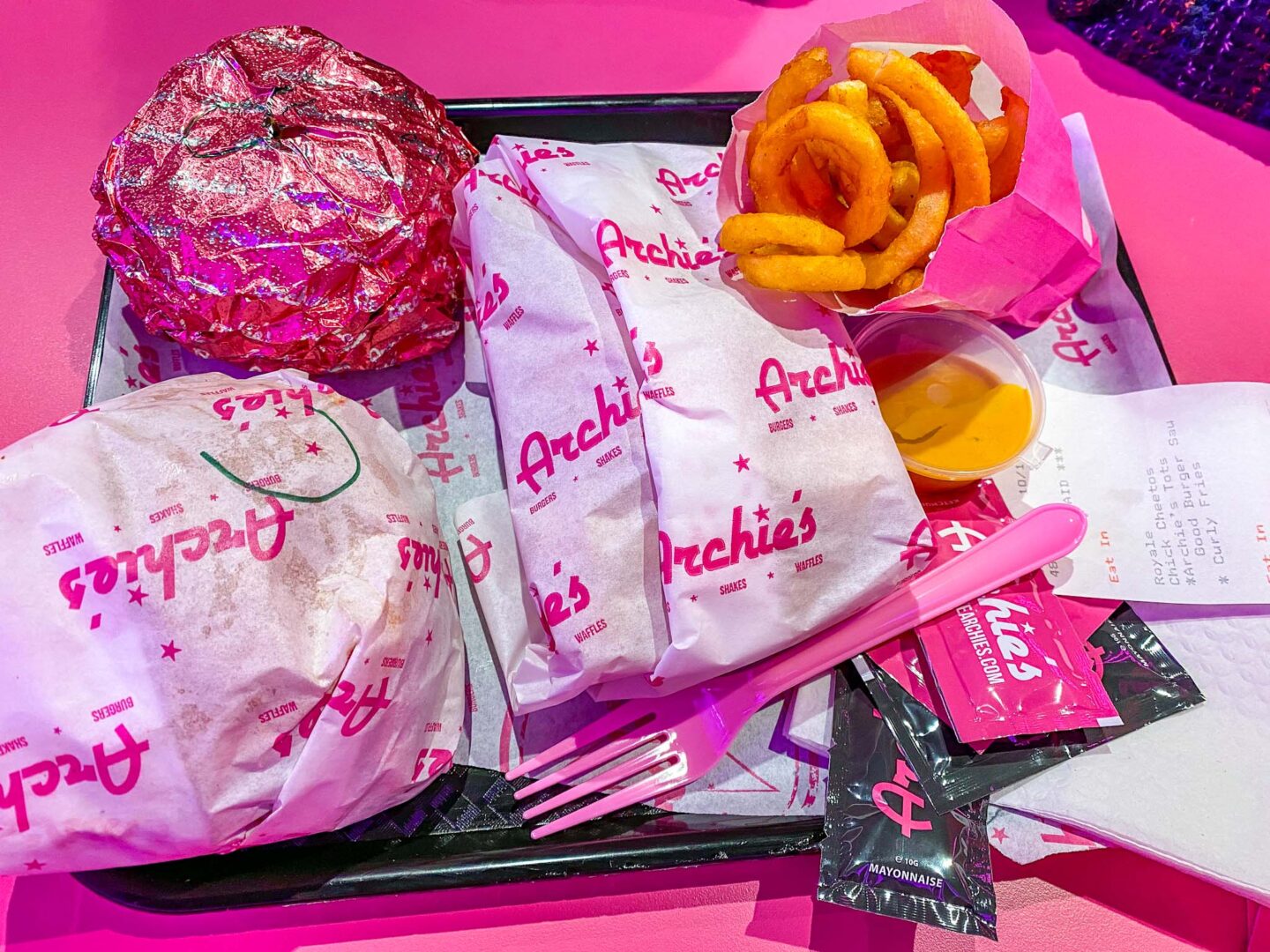 halal restaurants in manchester, archies food on pink tray, halal burger places Manchester