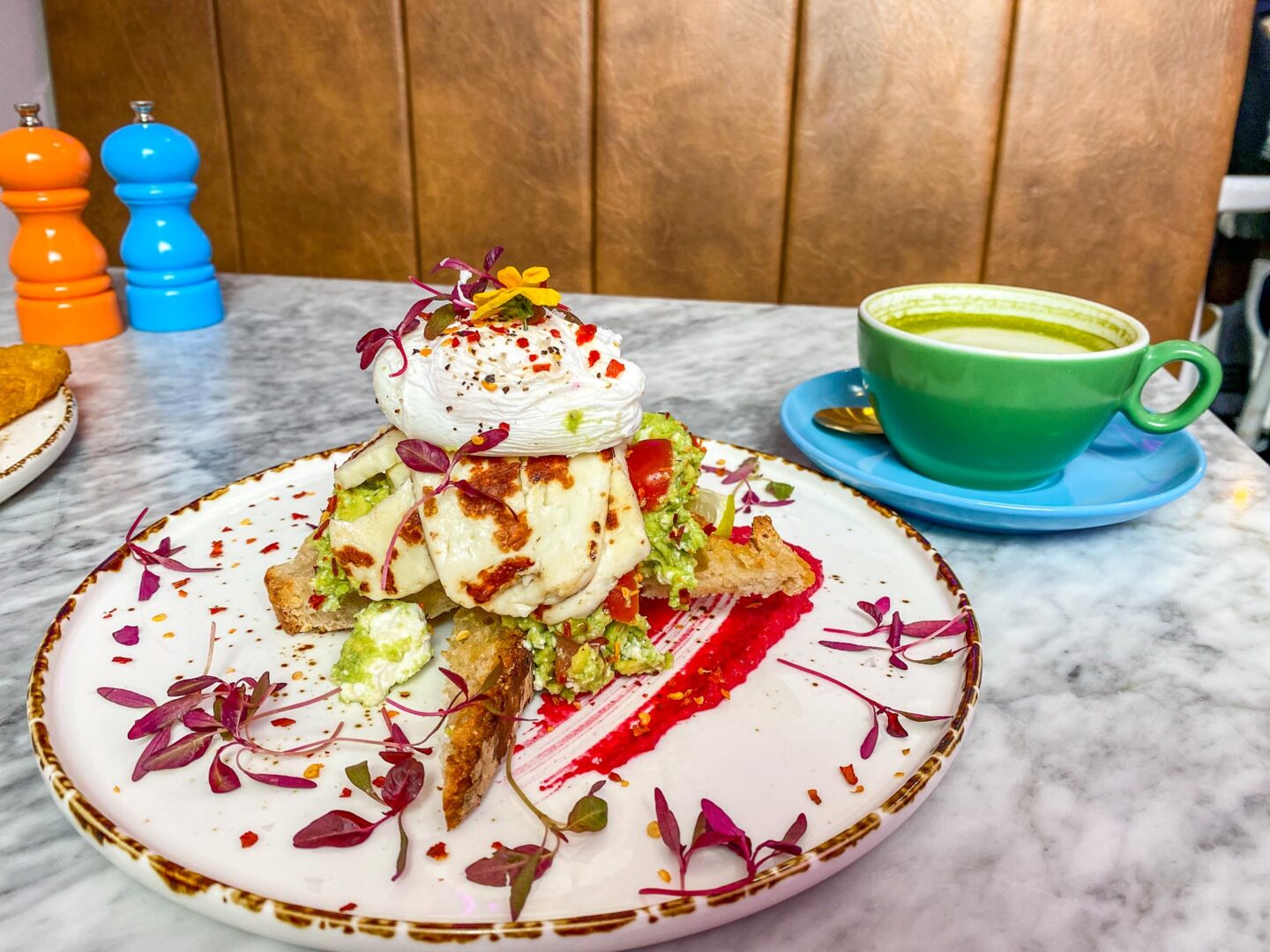 halal restaurants in manchester, Avocado and egg on toast with matcha latte at Caramello of Didsbury, halal brunch manchester