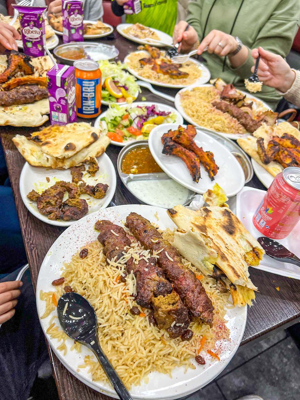 halal restaurants in manchester, table full of food Fromm Afghan Cuisine