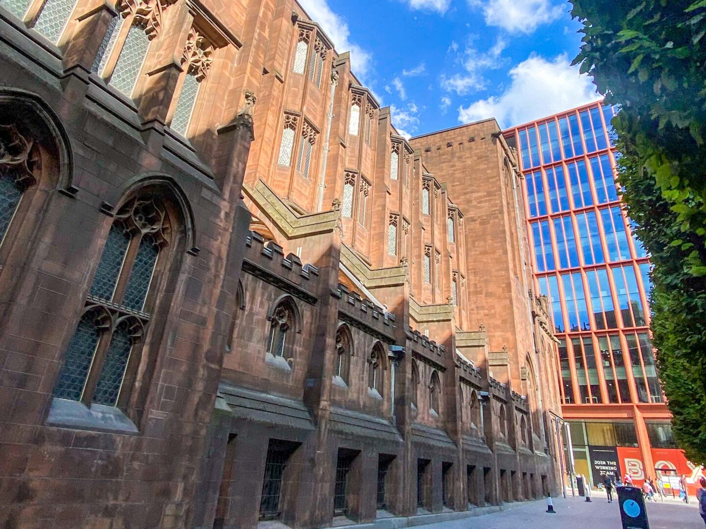 exterior of John Rylands Library, playing inside treetops adventure golf, Family Days Out in Manchester, Manchester with kids,
