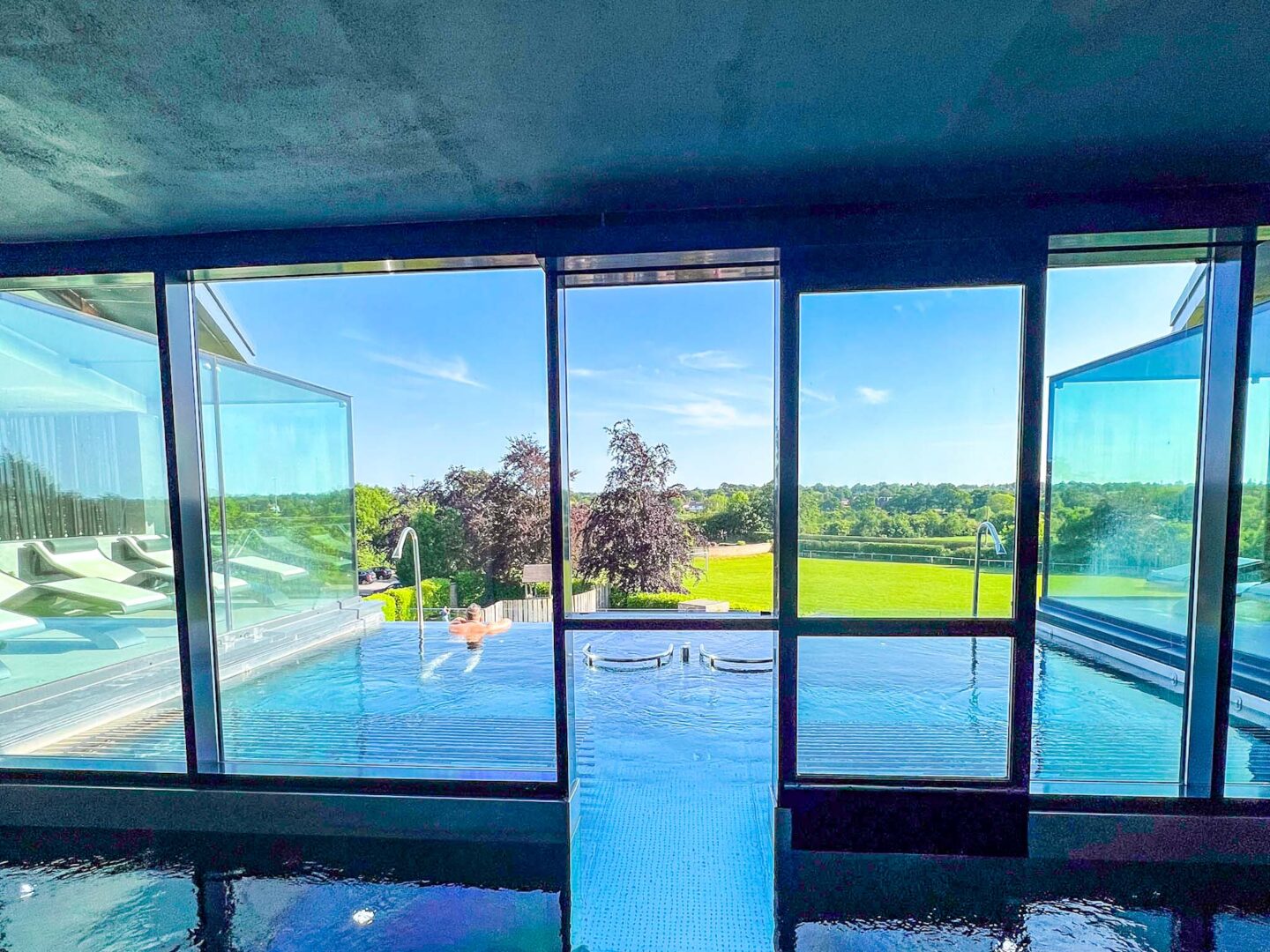Things to do in Altrincham, infinity pool at Hale Country Club Spa with blue skies