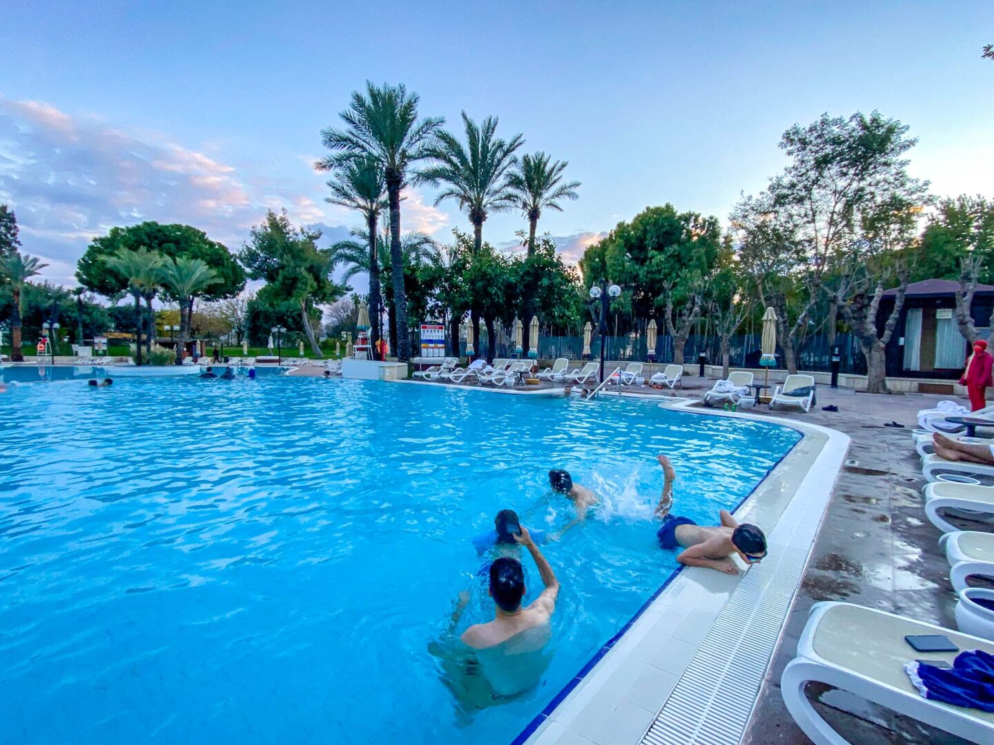 Best Places to Visit in Europe in December, , swimming pool in Antalya in December