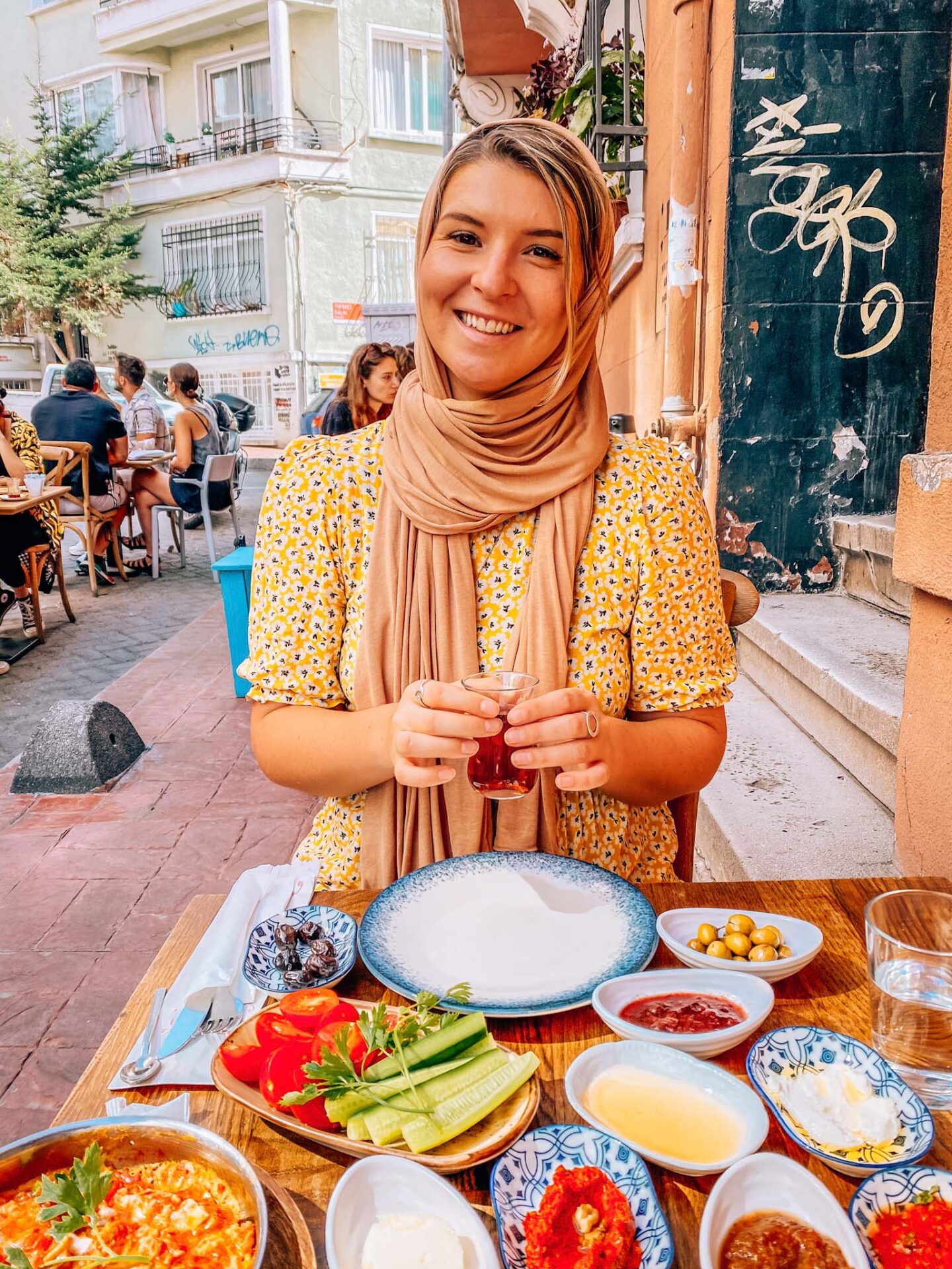 Ellie eating Turkish breakfast in a cafe in Istanbul