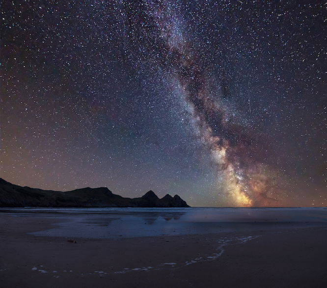 Wales in winter, Milky Way over Three Cliffs Bay, Swansea Gower