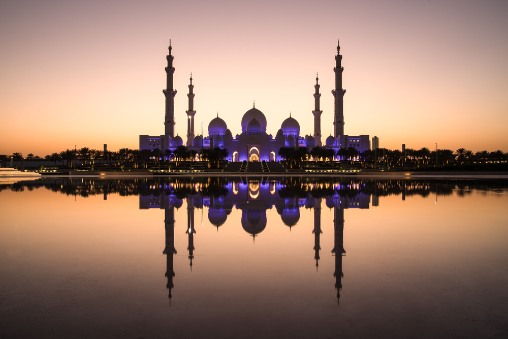 Sheikh Zayed Mosque with water and sunset, visiting Sheikh Zayed Mosque
