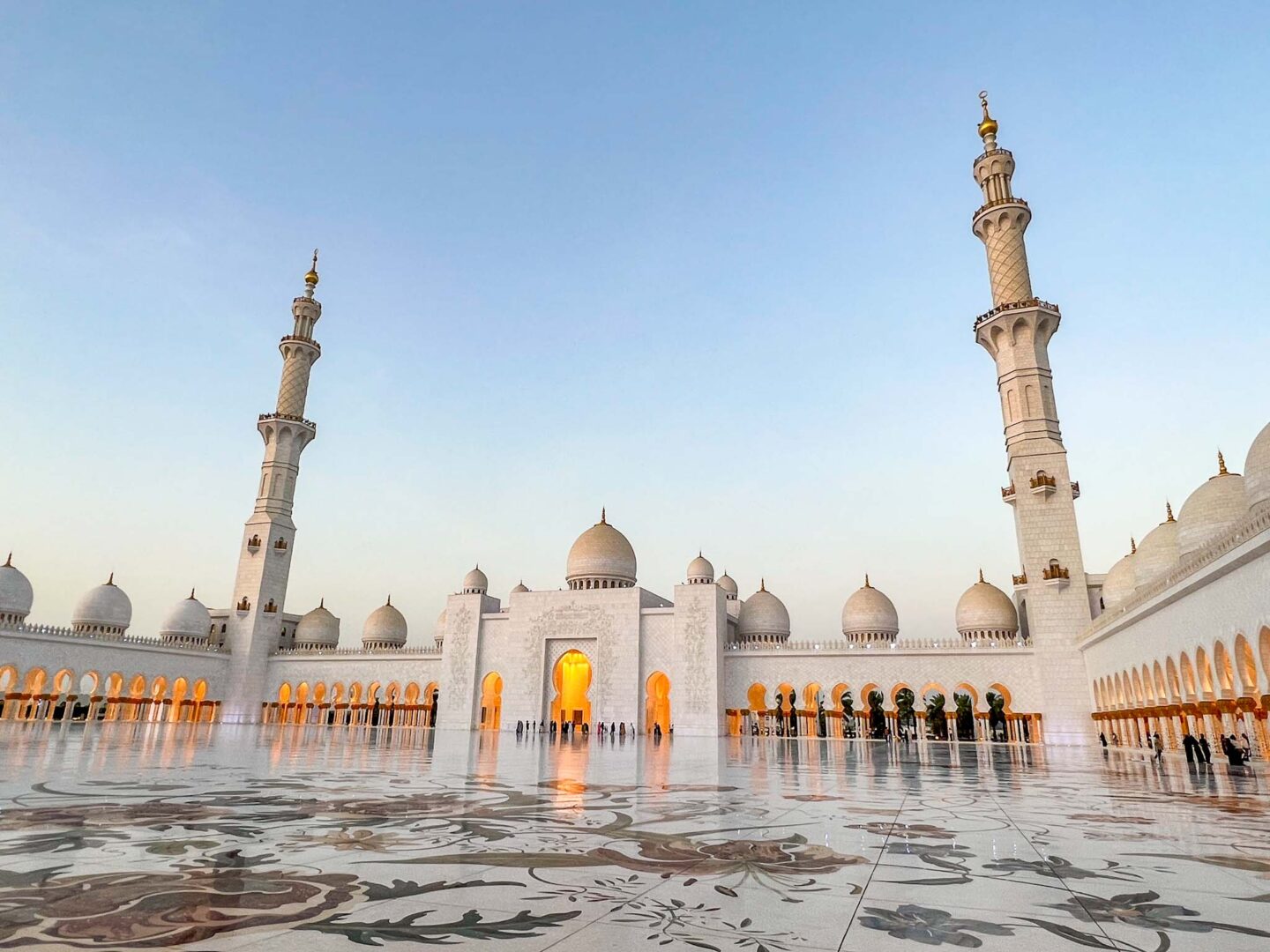 main courtyard of Zayed mosque at sunset,  visiting Sheikh Zayed Mosque
