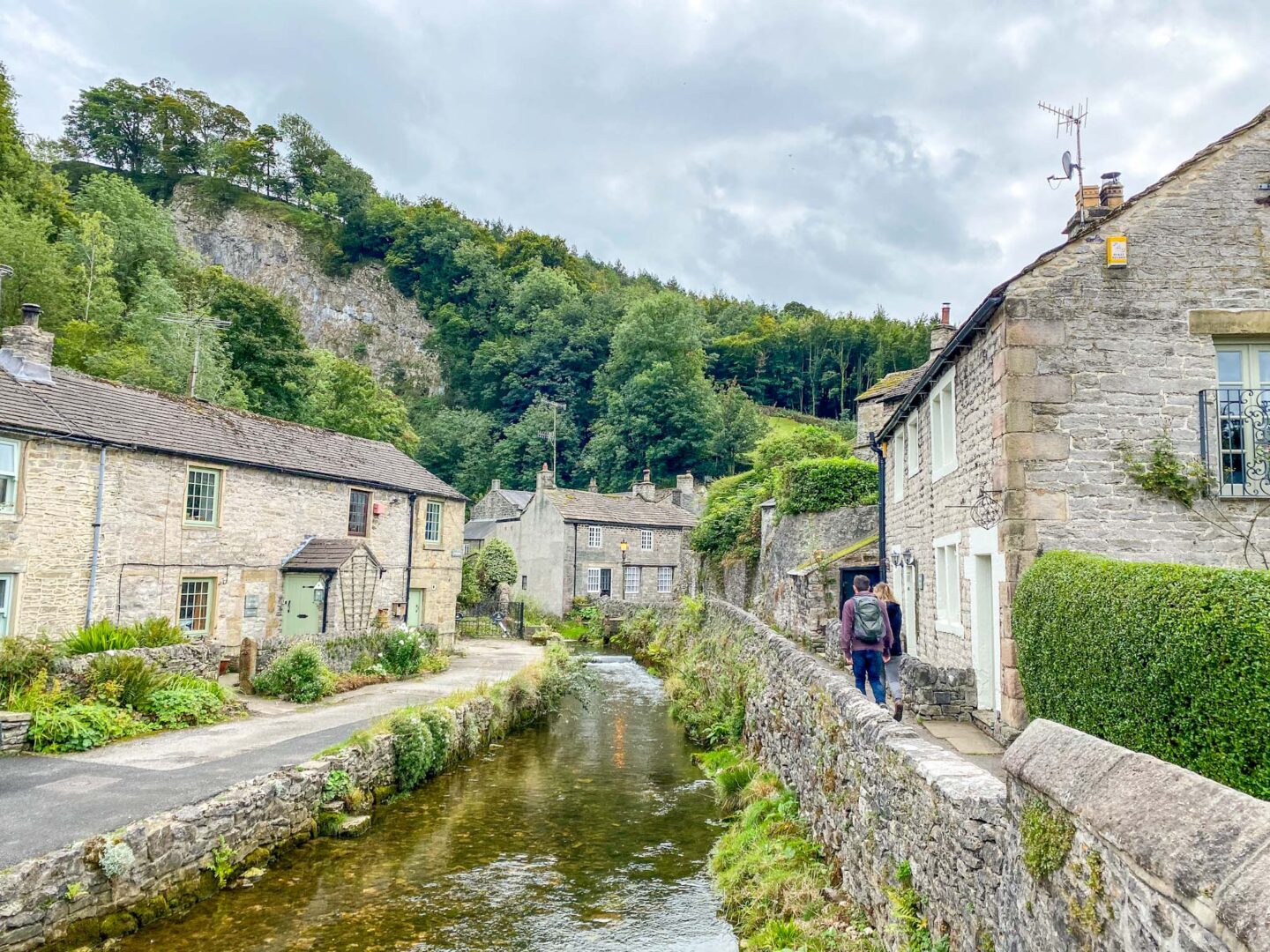 Peak District day out, Castleton village stream and houses