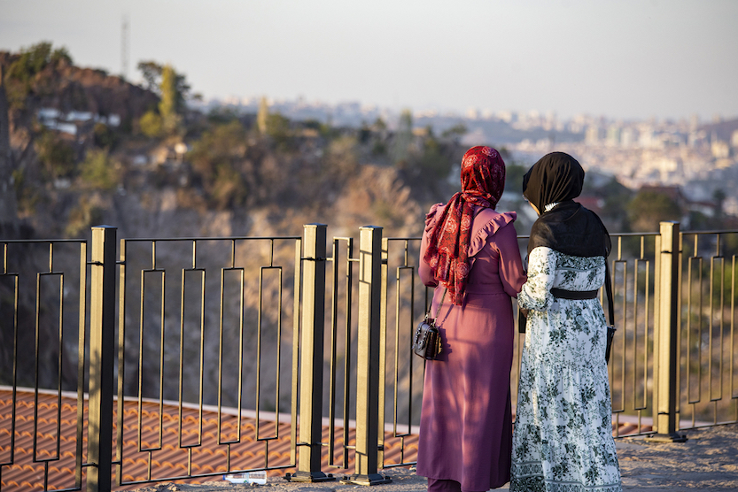 what to wear in Turkey, 2 muslim women in long dresses and hijab in Ankara Turkey