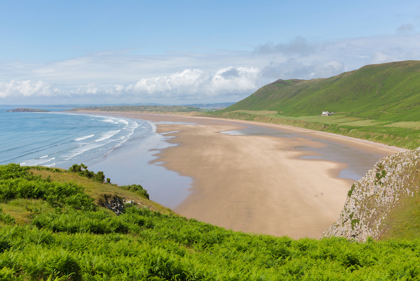 best beaches in South Wales, view of Rhosili Bay Beach from the coastal path above