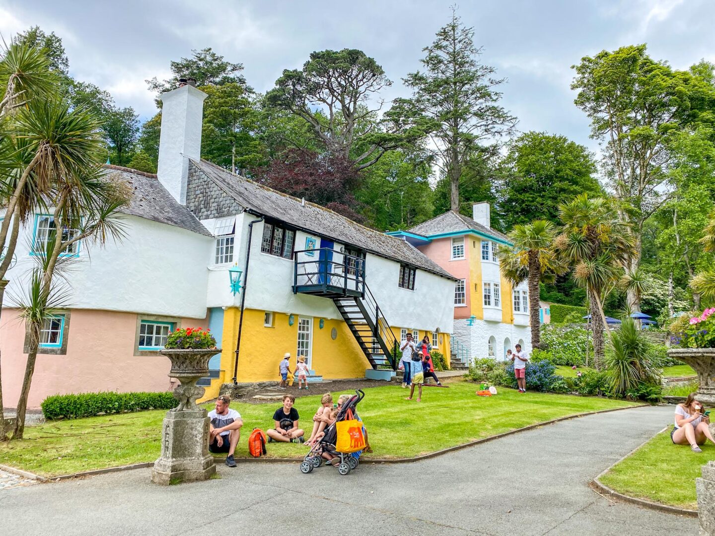 visiting Portmeirion, colourful building with cloud in Portmeirion village