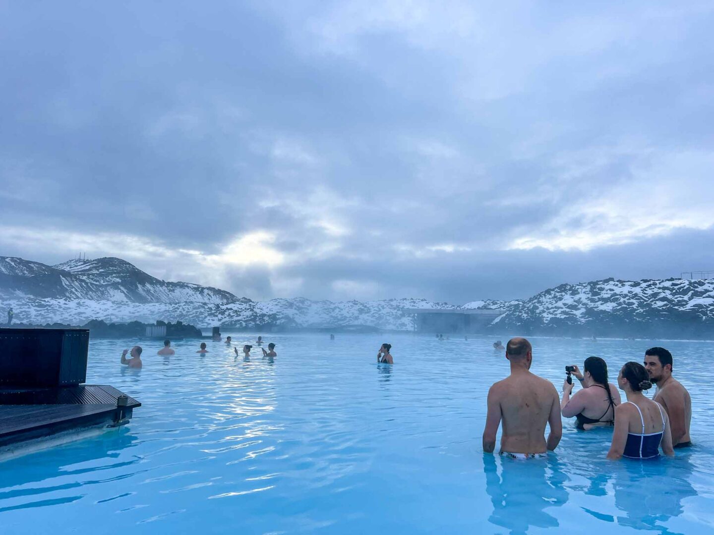 The Wandering Quinn Travel Blog Visiting the Blue Lagoon,  people enjoying the Blue Lagoon in Iceland