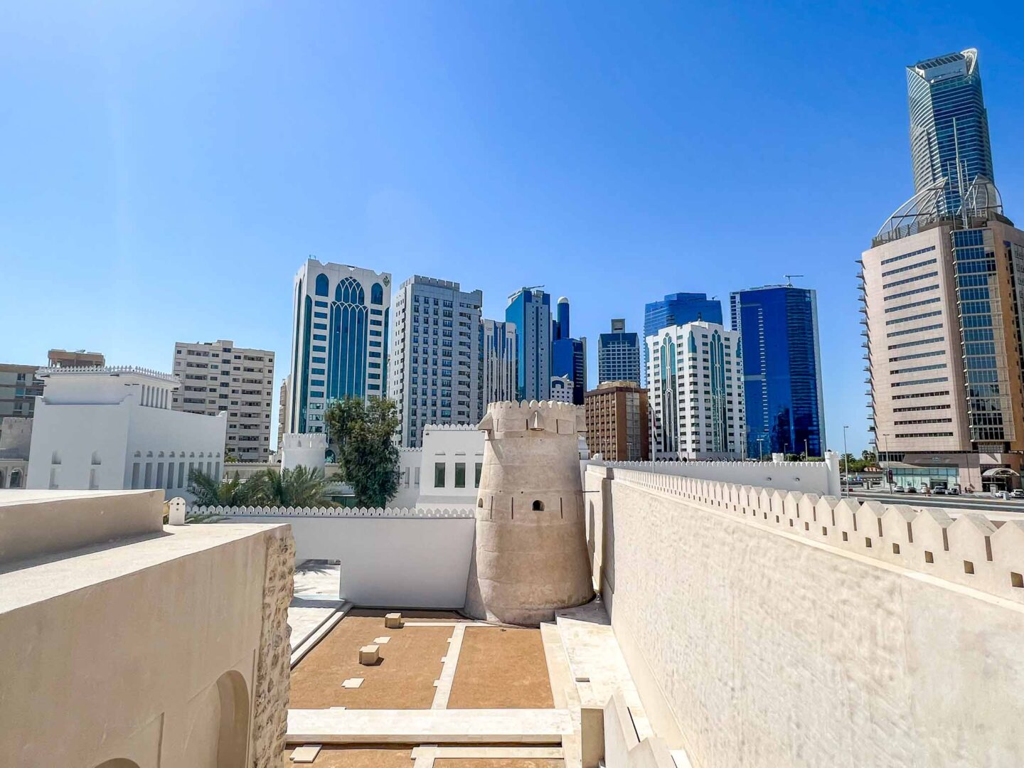 The Wandering Quinn Travel Blog Dubai vs Abu Dhabi, Abu Dhabi Fort with City Skyline Views