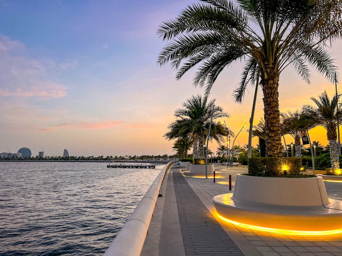 The Wandering Quinn Travel Blog Dubai vs Abu Dhabi, sunset on Yas Island walkway