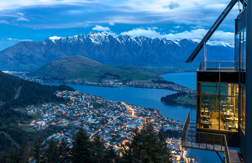 Best countries to visit in August, Queenstown from above at nighttime with snow in winter