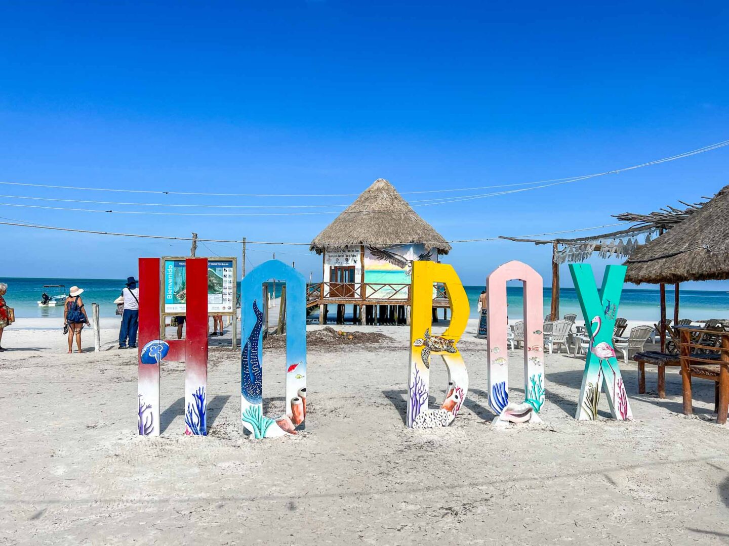 Best countries to visit in August, Hotbox sign on Isla Holbox beach