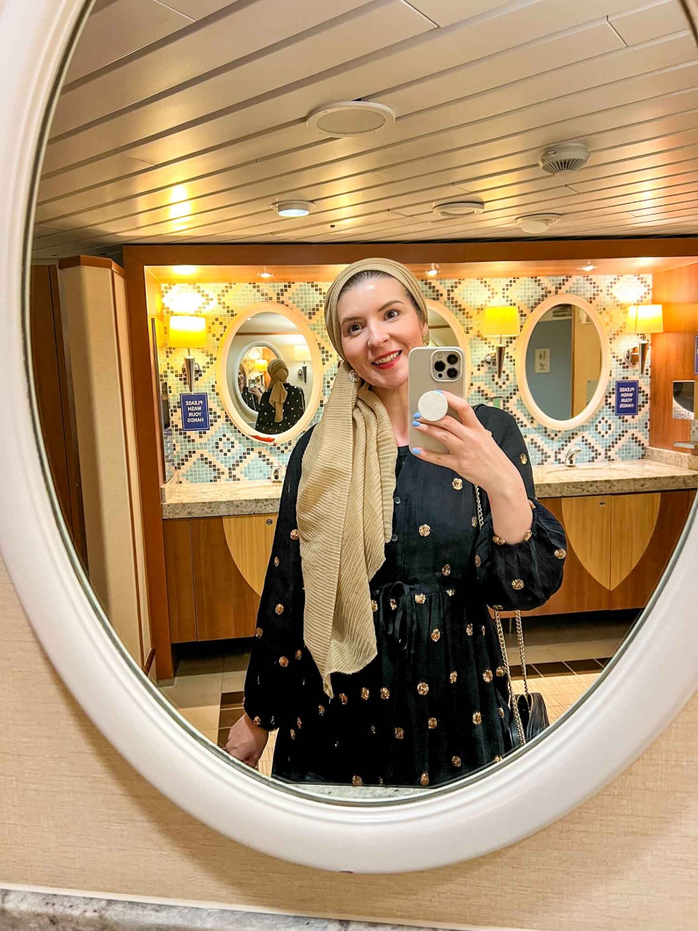 The Wandering Quinn Travel Blog Tui cruise review, Ellie in bathrooms onboard Marella Discovery 2