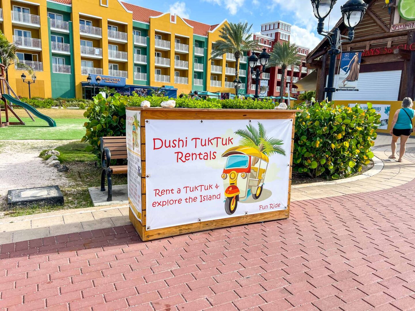 The Wandering Quinn Travel Blog tuk tuk tour sign on Caribbean island for cruise tourists