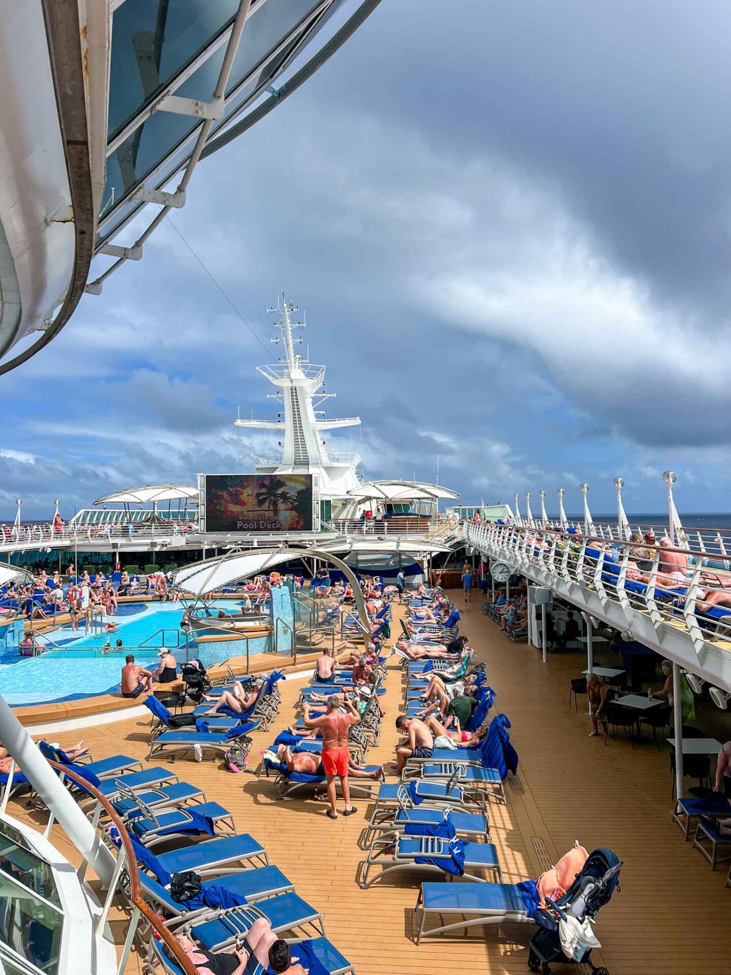 The Wandering Quinn Travel Blog Tui cruise review, passengers by pool on cruise ship