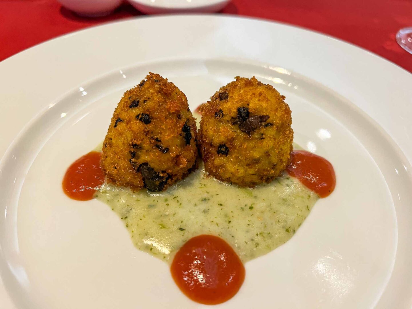 The Wandering Quinn Travel Blog Tui cruise review, Arancini dish from Italian restaurant onboard Marella Discovery 2